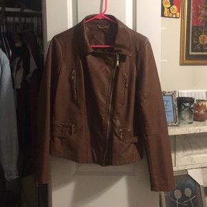 Brown leather jacket with gold zippers